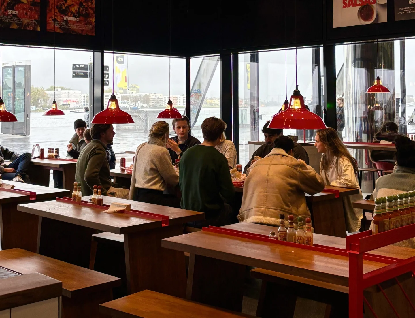 Guests enjoying fresh Mexican food at a Salsa Shop by the waterfront